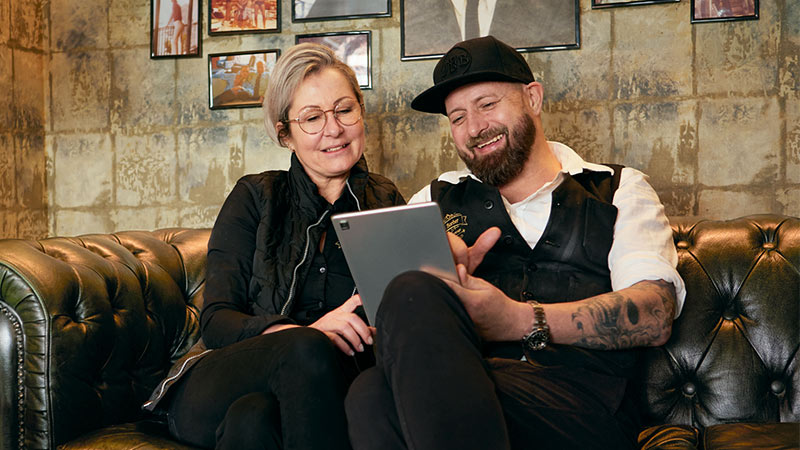 Couple looking at tablet